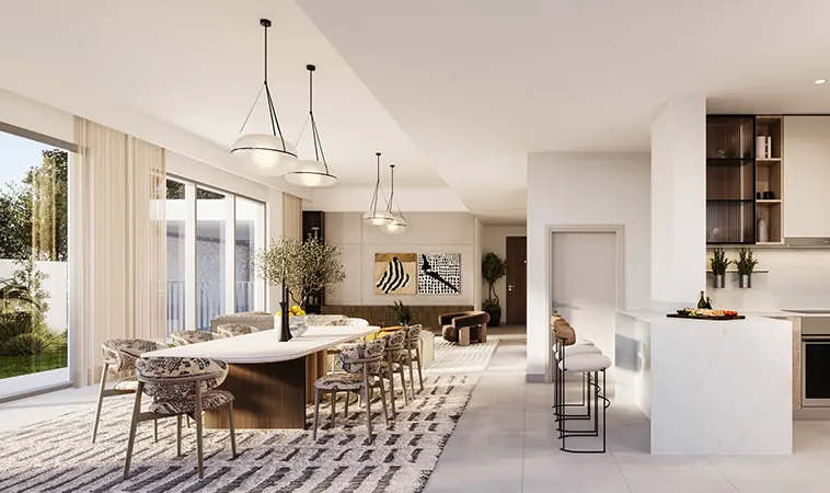 Bright open-plan kitchen and dining area inside a modern Fairway Villas 3 home in Emaar South.
